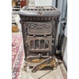 Antique cast iron stove, 90cm high x 61cm wide x 47cm deep