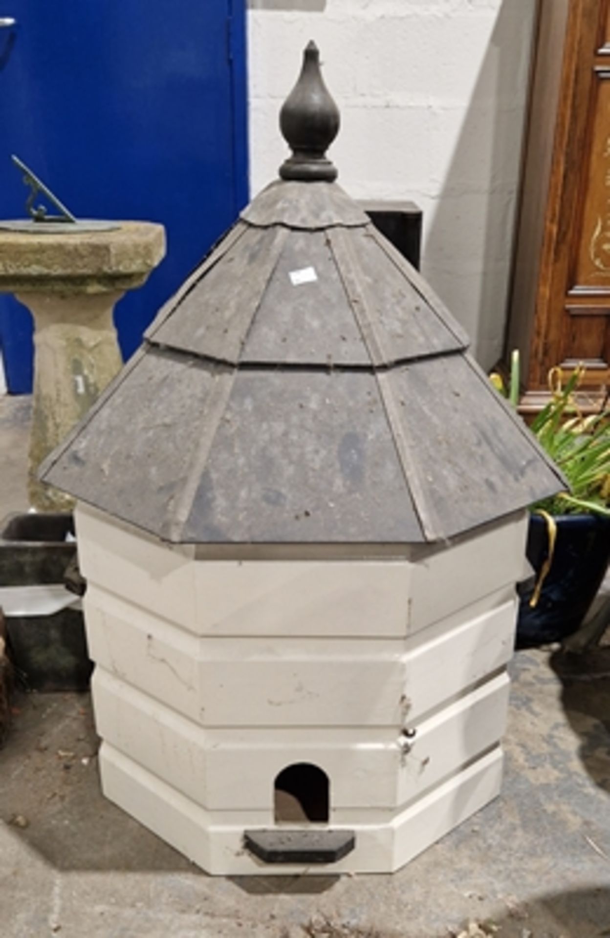 White painted wooden dovecote with lead and slate-effect roof topped with a wooden finial, 90cm high