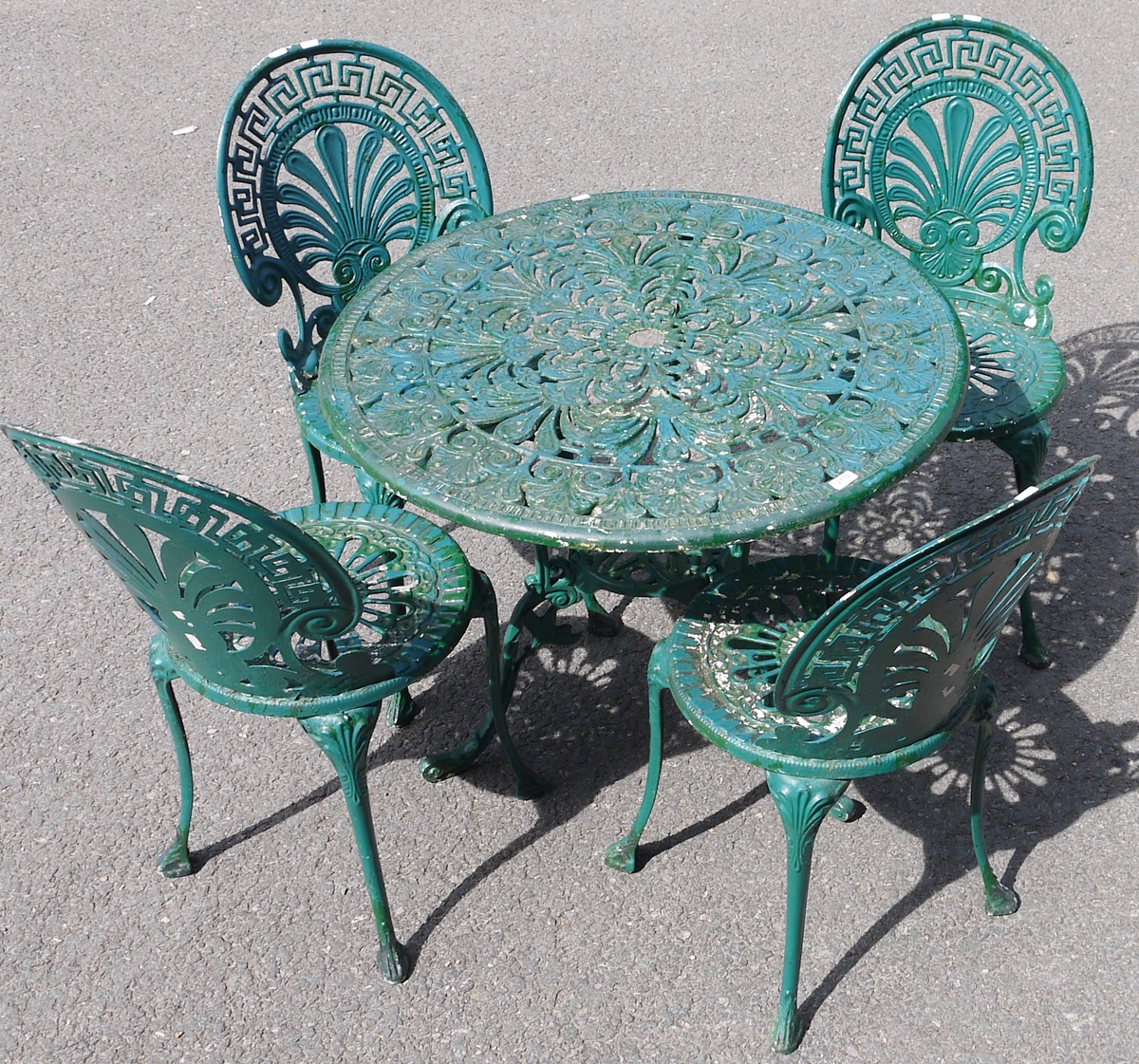 Victorian style metal painted garden table and four chairs (5)