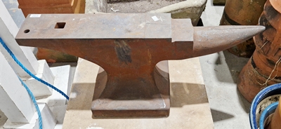 Cast metal anvil, 37cm high (cracked)