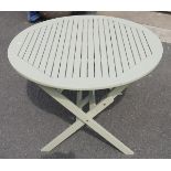Pale green painted garden table, round, folding,  by 'Hartman', 100cm x 110cm