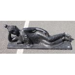 Plaster cast reclining Buddha, black painted