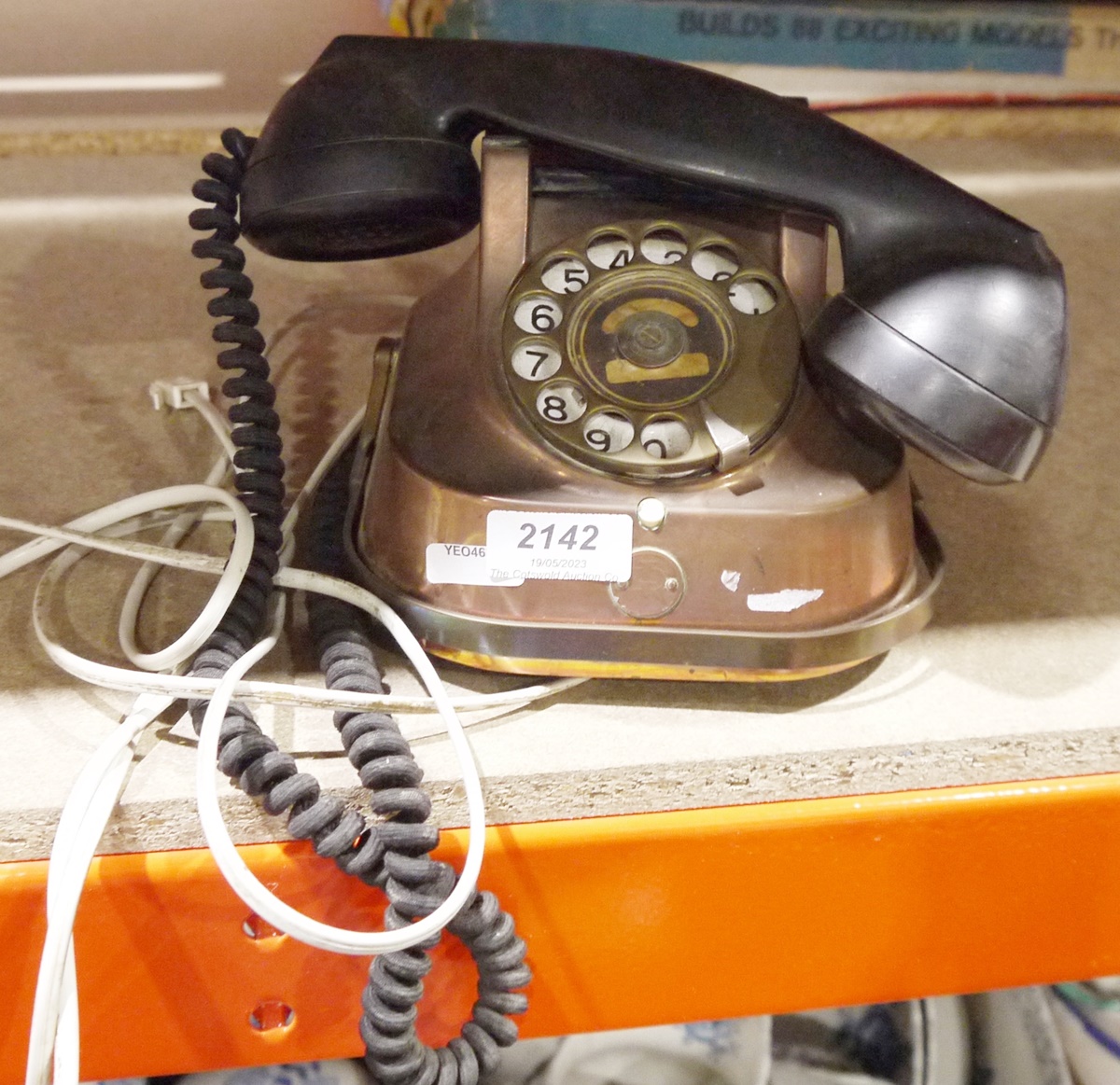 Vintage Belgium FTTR copper cased telephone, with black bakelite handset, inscribed RTT-56 to base