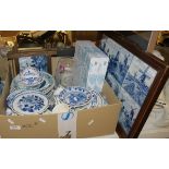 Quantity of delft blue wares to include four large plates and others with countryside scenes,