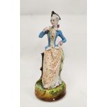 Late 19th century French porcelain figure of a lady forming a lamp base, modelled standing,