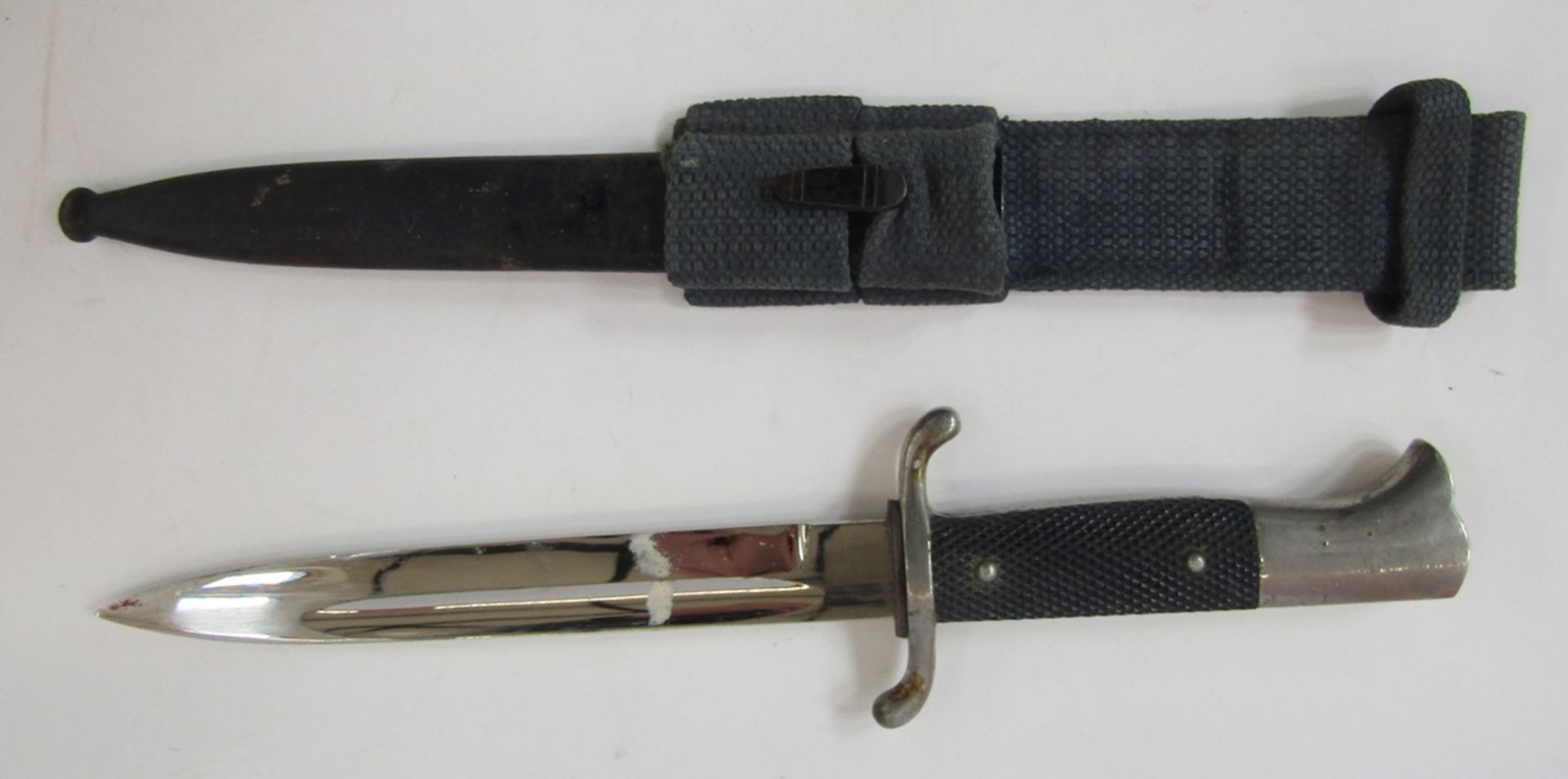 WWII German fireman's dress bayonet with scabbard and bayonet frog.