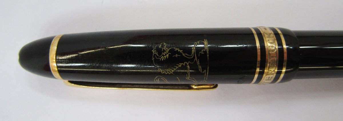 Montblanc Meisterstuck ball point pen, black with gold band decoration, engraved lion crest and name - Image 2 of 3