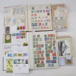 GB & World stamps: Two small albums and 2 sleeves of loose stamps in envelopes/packets with GB first
