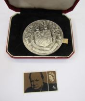 Winston Churchill silver medal by John Pinches (medalists) with 4d stamp.