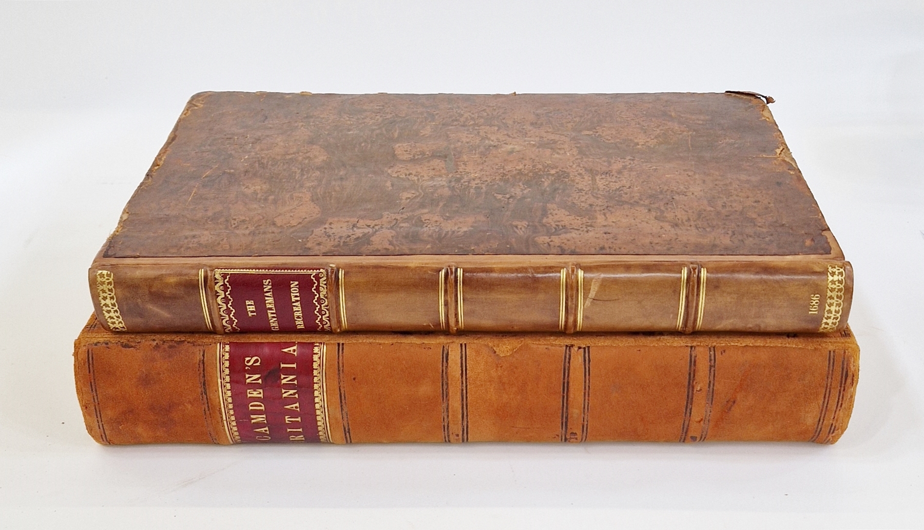 Two antiquarian volumes - lacking all plates and maps - Camden, William  "Camden's Britannia Newly
