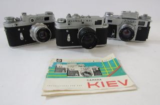 Three USSR cameras, comprising Zorki 4K, no 75895905, with Jupiter 8 2/50 lens, Kiev with 2/53