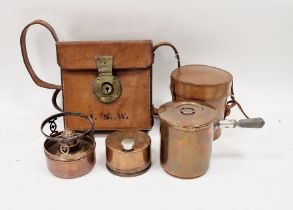 Early 20th century copper WWI era officer's campaign stove and pot, embossed initials to lid N.E,