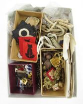 Quantity of military brass buttons, cap badges, cloth badges, 'The Metropolitan' whistle and similar