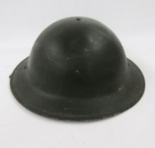 WWI British Army Brodie helmet mark 2, stone cannonball and iron spearhead.