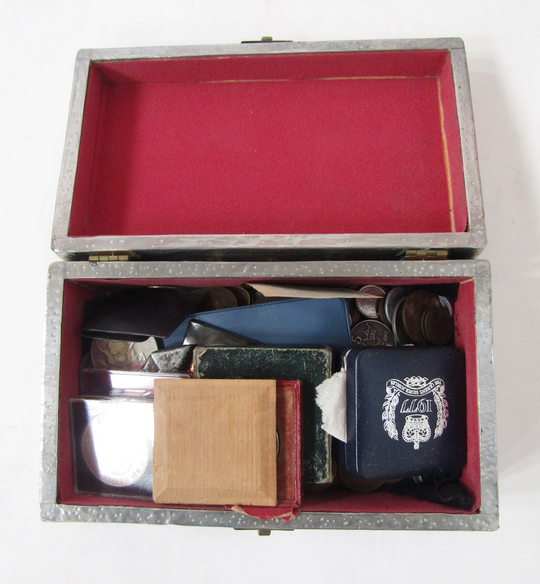 Box of coins from around the world, including 1977 proof crowns (2), silver medal 1835 awarded to