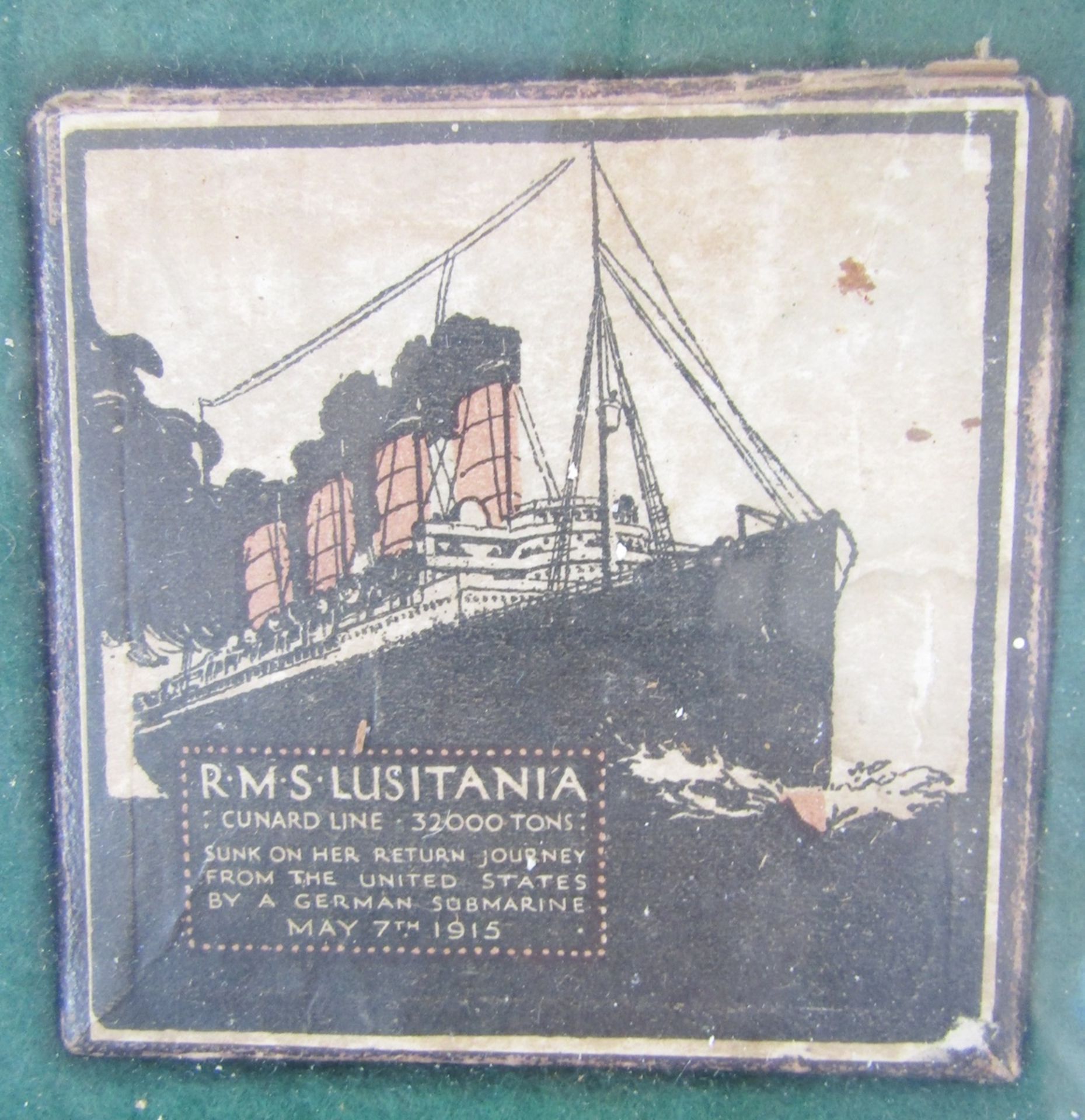 Two WWI RMS Lusitania medals with box and leaflet within glazed frame. - Image 2 of 4