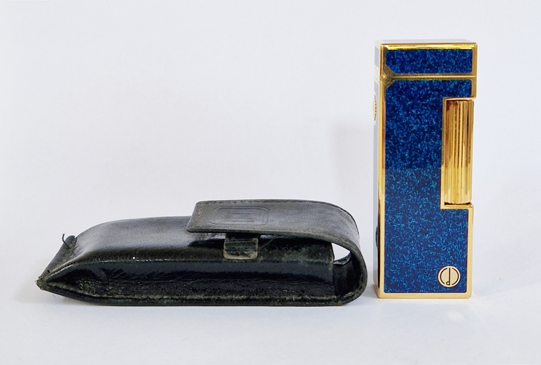 Dunhill gilt metal and blue lacquered lighter, the lacquer mottled blue and turquoise, no number,