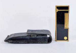 Dunhill gilt and black lacquer lighter, no.TL4267 with Dunhill leather pouch