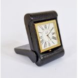 Dunhill gilt metal and leather covered folding travel clock, rectangular, the square face with Roman