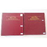 GB stamps: Two maroon folders of QEII philatelic lithographs; first of 27 commemoratives 1979-82,