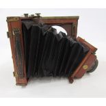 Late 19th/early 20th century Thornton Pickard Amber half plate mahogany cased field camera, patent