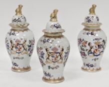 Three 19th century Samson of Paris porcelain baluster vases and covers, decorated in the Chinese