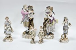 Two 19th century pairs of Volkstedt (Triebner Ens & Eckert) porcelain figures, both with two