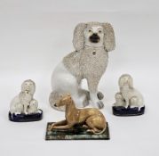 In the manner of Minton a majolica model of a brindle greyhound 12cm high, a late 19th century