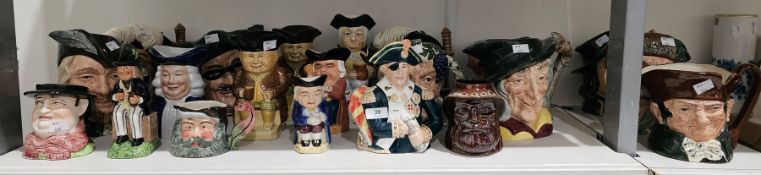 Collection of 21 ceramic toby and character jugs, including Royal Doulton Robin Hood D527, Porthos