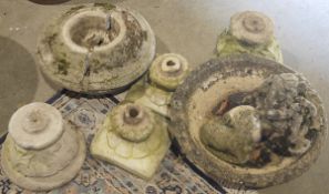 Various small broken bases, a bird bath, another bird bath (damaged), a reconstituted stone model of