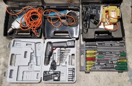 Assorted power tools including vintage Black & Decker drill, angle grinder, sander, another
