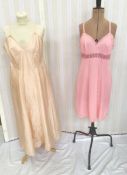 A 1940's apricot silk night gown or slip, labelled Fascinette, a blue nylon nightgown with ruffled