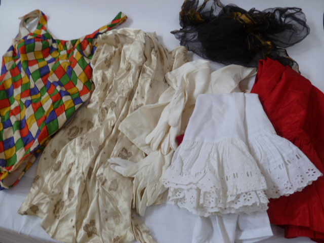 1950's swimsuit, harlequin pattern, a red taffeta petticoat, a white cotton petticoat with