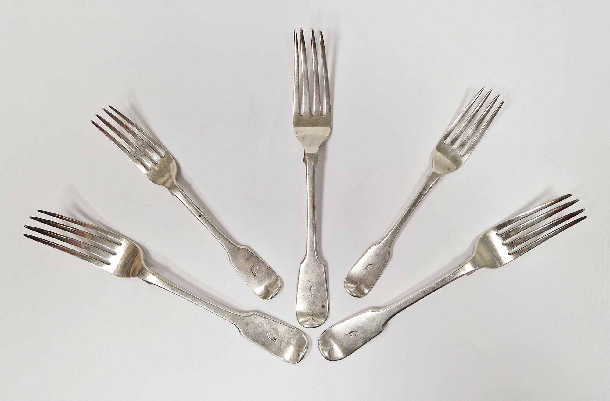 Five William IV silver table forks, London 1832 Hyam Hyams, matching of two different sizes,