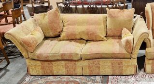Modern Knole-style three-seater sofa, the two drop ends secured with rope tassels, upholstered in
