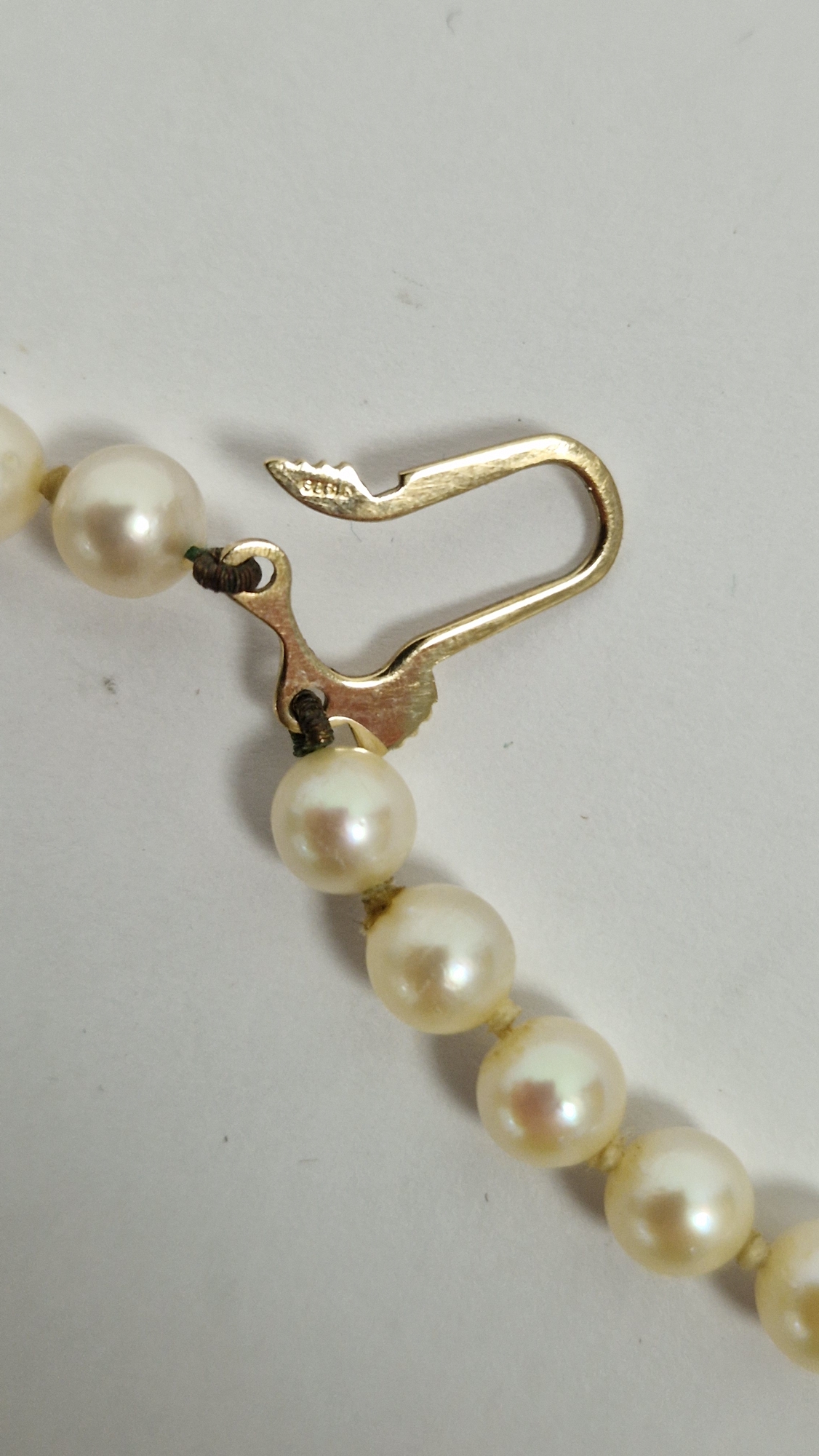 Double string of cultured pearls with 9ct gold and garnet set clasp, with star design, cased - Image 4 of 8