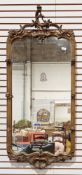 18th/19th century carved giltwood hanging wall mirror of rococo-style rectangular form, the frame