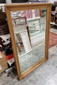 Large contemporary wall mirror with stained wooden frame and the mirror with bevelled edge, 84cm x
