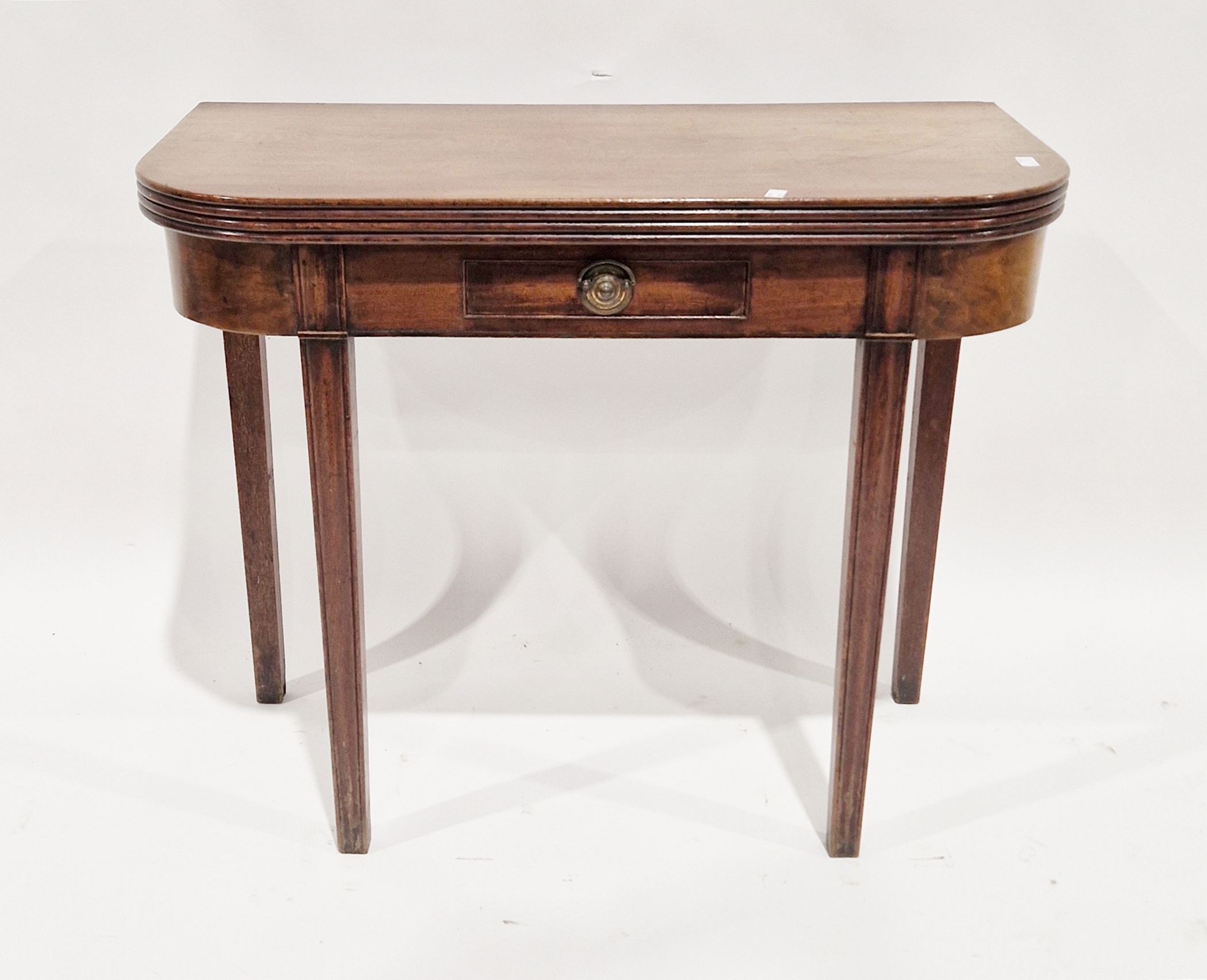 Early 19th century mahogany fold-over tea table with reeded rounded corners, single frieze drawer