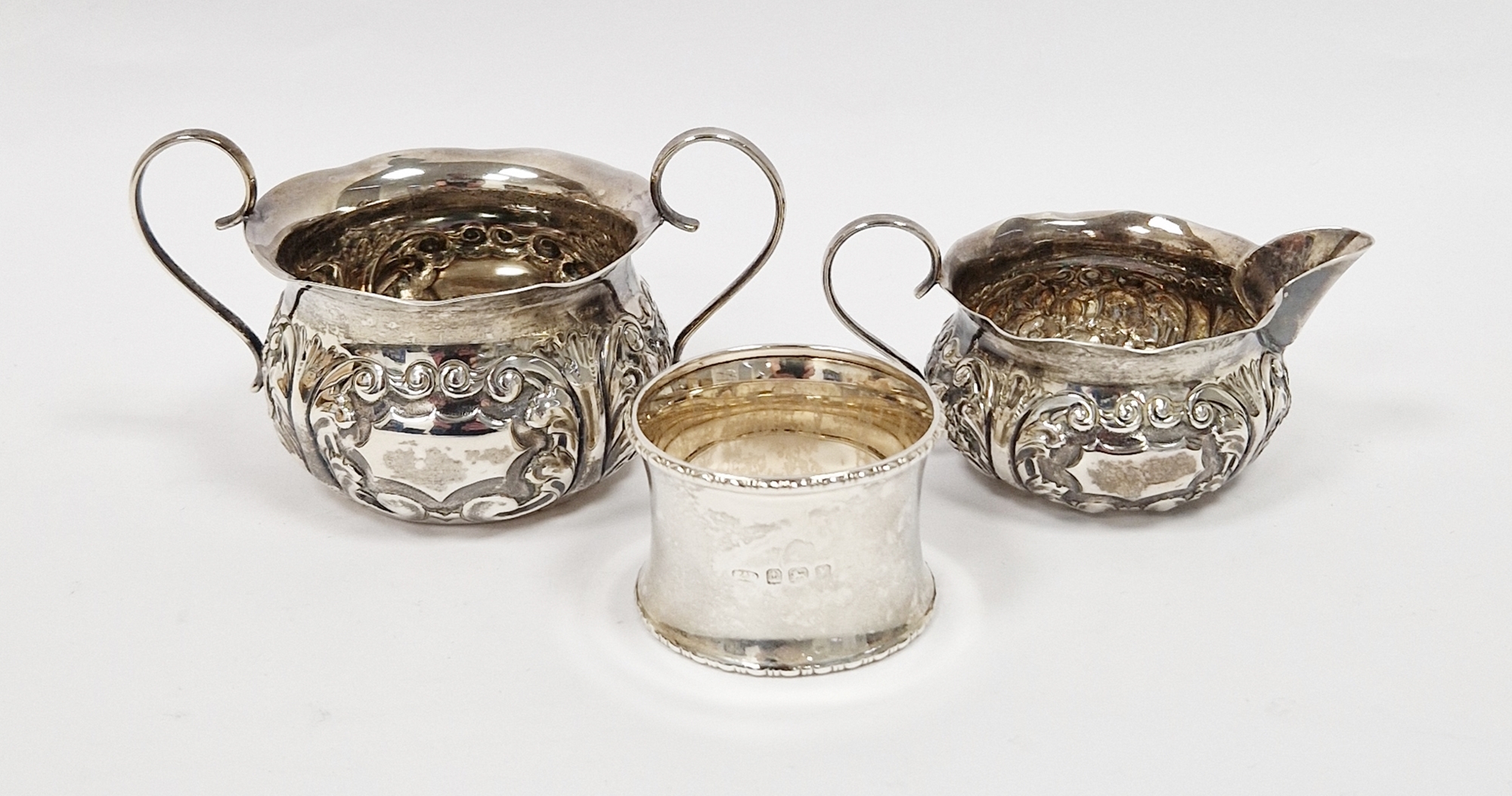 Victorian silver matching cream jug and sugar bowl, Birmingham 1887 George Unite, with repousse