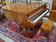 Wilh. Steinmann polished mahogany baby grand piano, the sound board numbered 1452852310, raised on