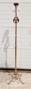 In the manner of W. A. S. Benson, Arts and Crafts brass and copper telescopic standard lamp, three