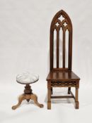 Victorian walnut adjustable circular piano stool raised on a carved bulbous support and three