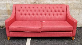 Multi York sofa upholstered in a red fabric with button back, curved arms and two seat cushions,