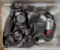 Canon EOS 5000 camera, a Fujifilm Finepix S5700 digital camera, a JVC Everio digital camcorder