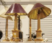 Pair of simple column lamps on square section wooden plinth bases and three similar turned wooden