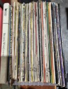 Box of vinyl LPs mostly easy listening and pop including Nat King Cole, Stevie Wonder, Songs in