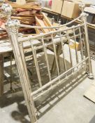 Double bed with chrome-effect head and footboard, with orb finials to bedposts