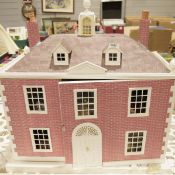 Wooden dolls house to include various items of furniture in the Georgian-style