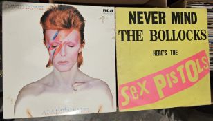 Heavy duty DJ's LP carry case containing an interesting collection of rock and pop vinyl albums